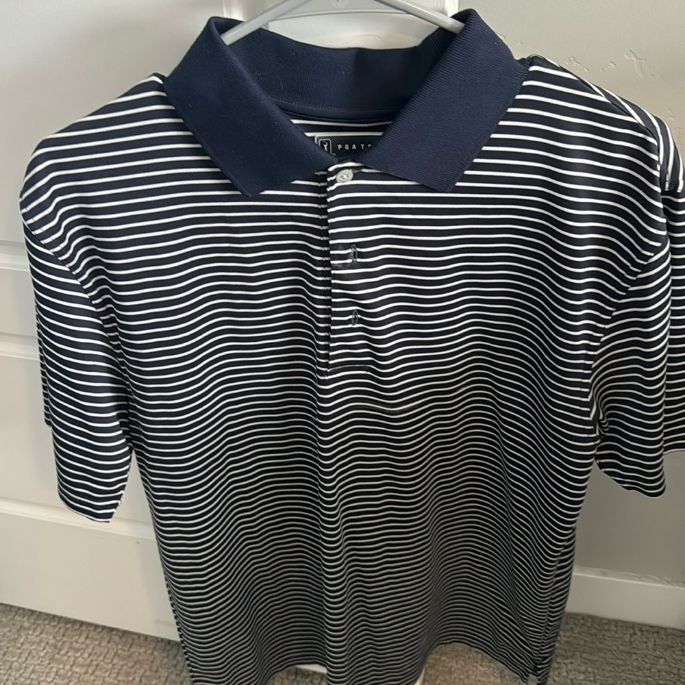 Men’s golf shirt… good condition but has a tiny bit of deodorant on it